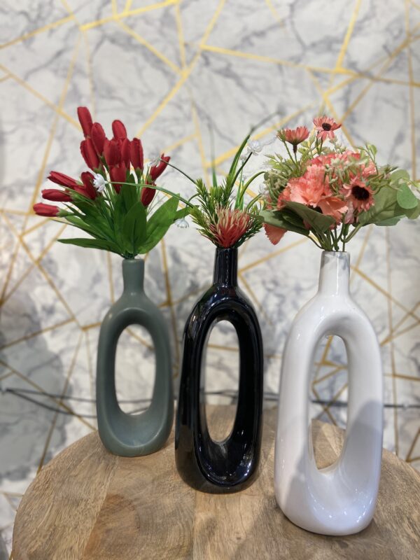Elegant Ceramic Vase with Soft Floral Accent